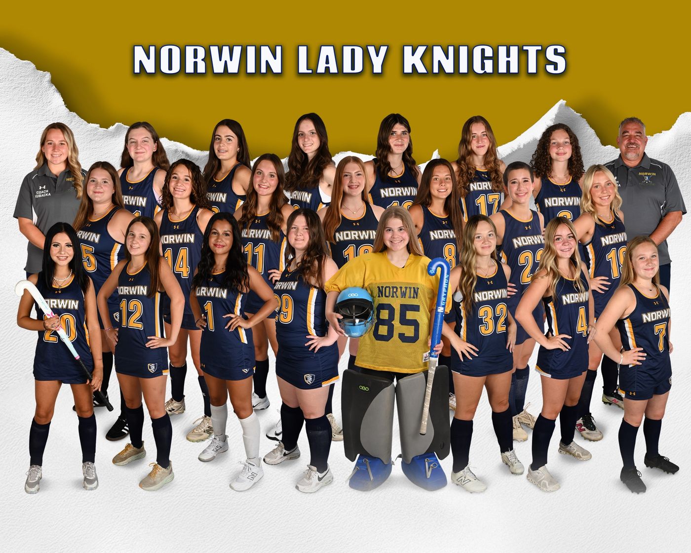 2026 Norwin Lady Knights field hockey team photo — all players in navy jerseys, goalkeeper in gold, with Coach Kubacka